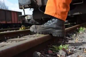 Does a company have to pay for safety shoes?