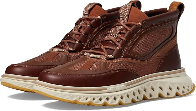 Brown leather Cole Haan 5.Zerogrand chukka boot with white sole.