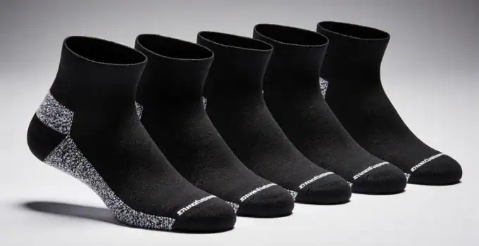 High-performance black ankle socks designed for sports and everyday wear, offering comfort, breathability, and snug fit for active lifestyles.