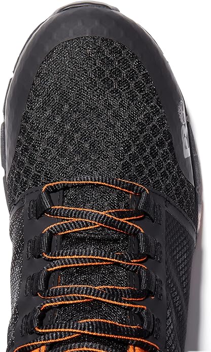 Close-up of a black athletic shoe with orange laces.