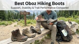Close-up of Oboz hiking boots displayed outdoors with a hiker in the background at a trailhead, emphasizing durability and comfort for trail hiking.