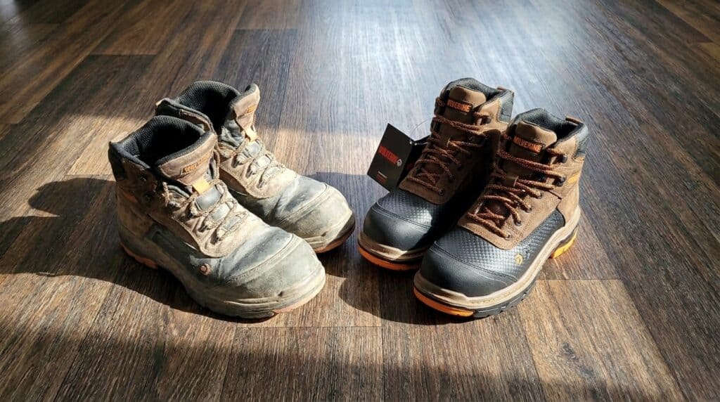 Worn Wolverine Overpass work boots next to a new pair, BootsGuru.com