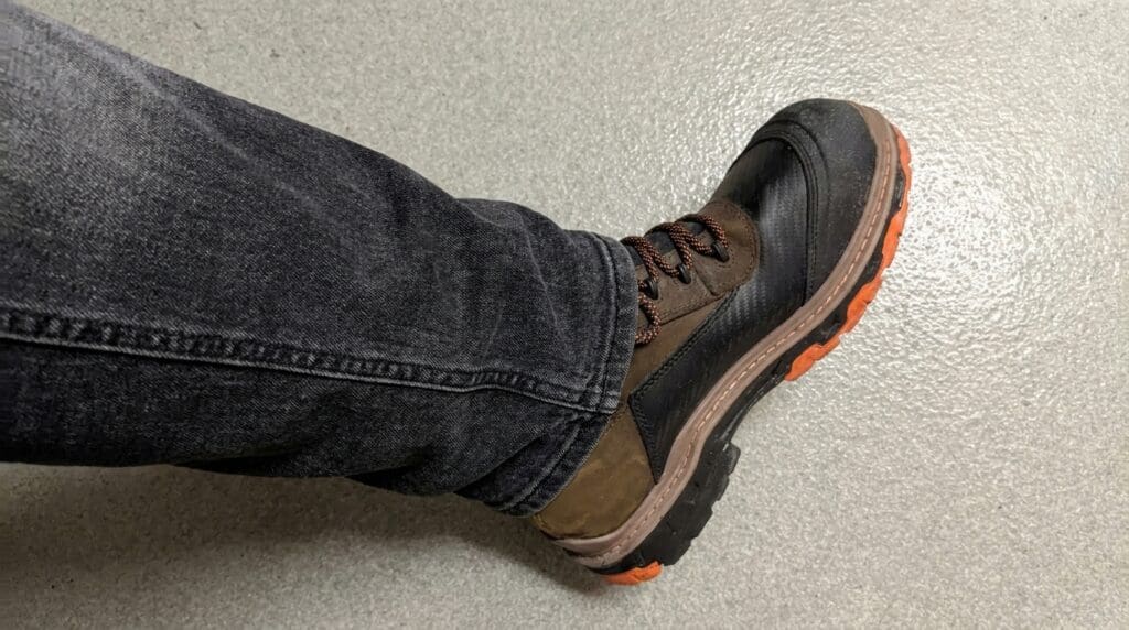 Wolverine Overpass work boot worn with jeans, side view, BootsGuru.com