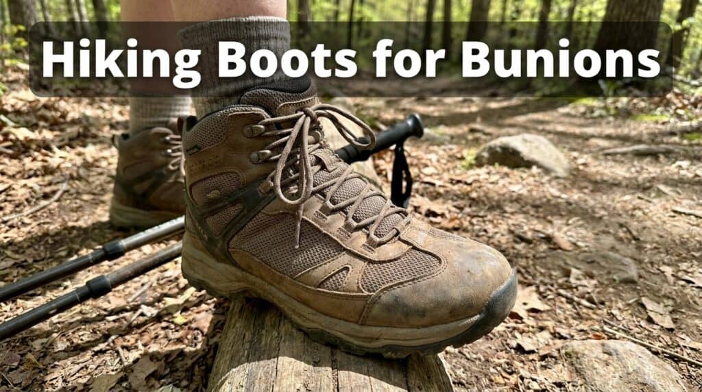 Close-up of a sturdy hiking boot on a forest trail, suitable for bunions and wide feet, emphasizing comfort and support for outdoor activities.