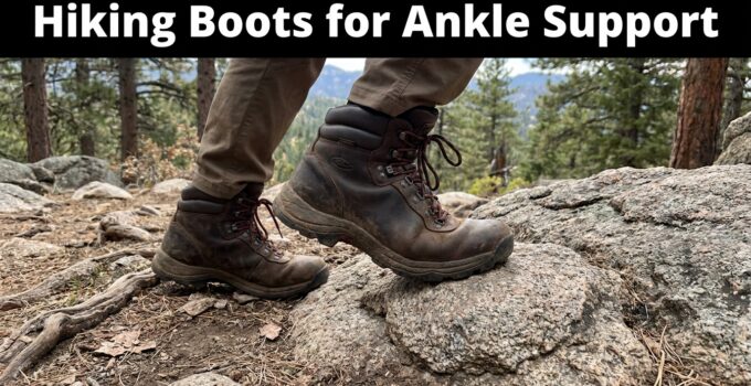 Close-up of hiking boots on rocky trail with trees in background, emphasizing ankle support for outdoor hiking.