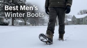 Close-up of men's winter boots walking through snow, showcasing waterproof and insulated features for cold weather.